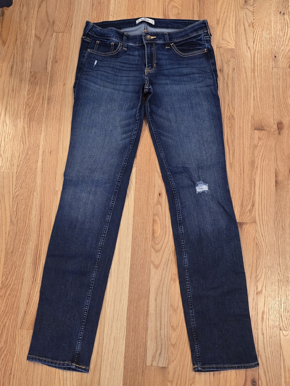 Hollister Women's Skinny Jeans in Dark Indigo with Light Distress